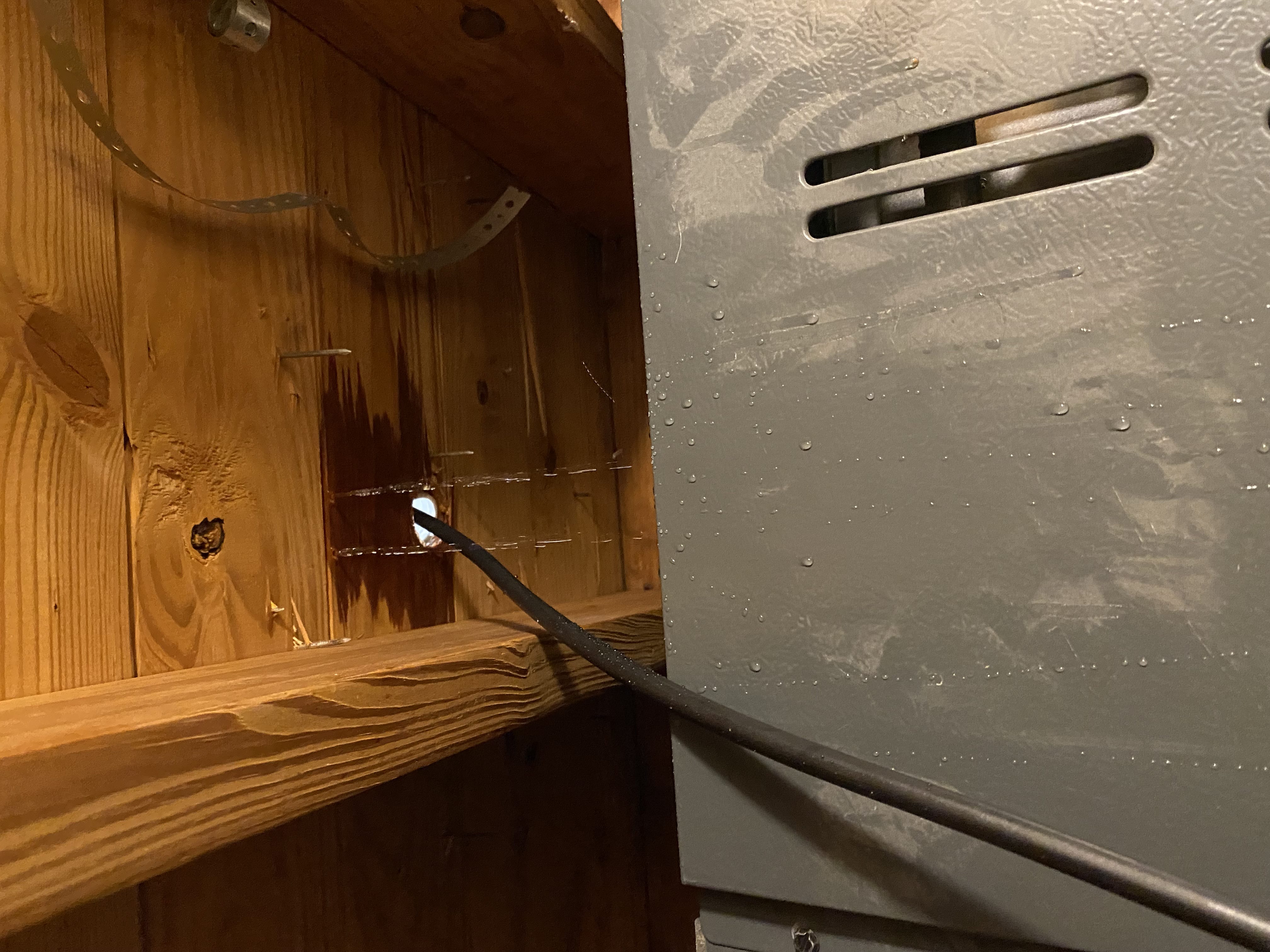A giant leak in my roof, viewed from the inside of the attic